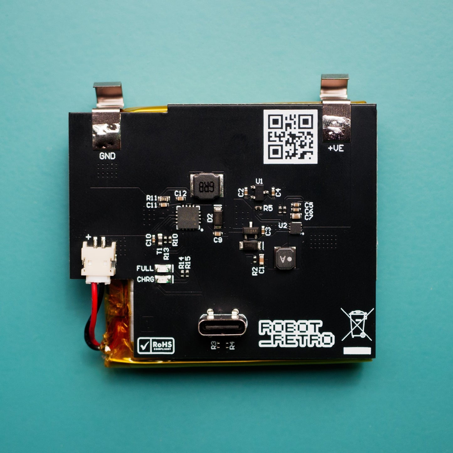 USB-C rechargeable 3000 mAh battery installed inside a classic Game Boy Original (DMG) console showing charging cable connected robot retro