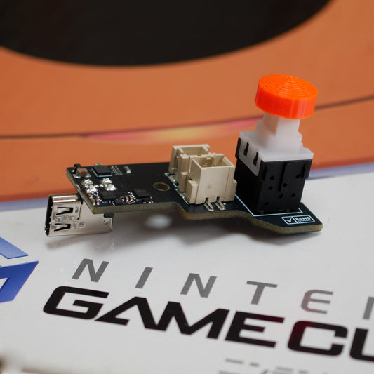 USB-C power supply for Gamecube console, modern replacement adapter providing safe and reliable power robot retro